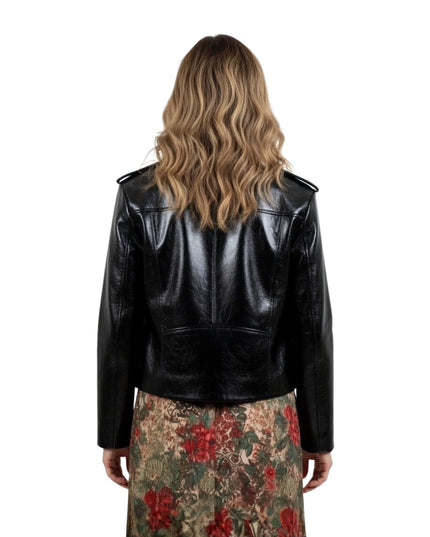 Person wearing a black leather jacket on a white background