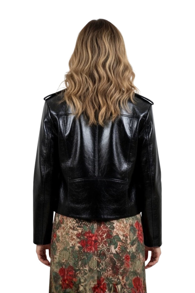 Person wearing a black leather jacket on a white background