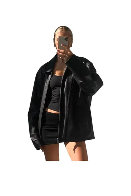 90s oversized women’s jacket with relaxed fit and vintage style look.