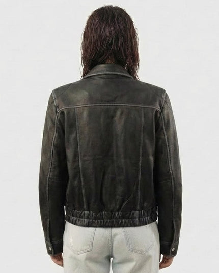 Person wearing a dark leather jacket from behind on a white background