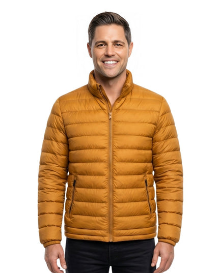 Man wearing a mustard yellow puffer jacket on a white background