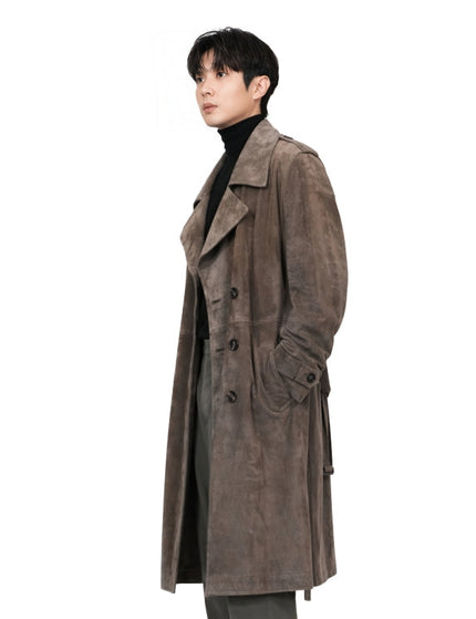 Man wearing a brown trench coat on a white background