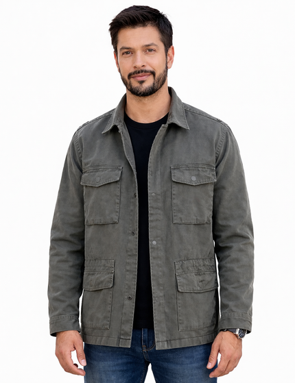 Man wearing a gray jacket on a white background