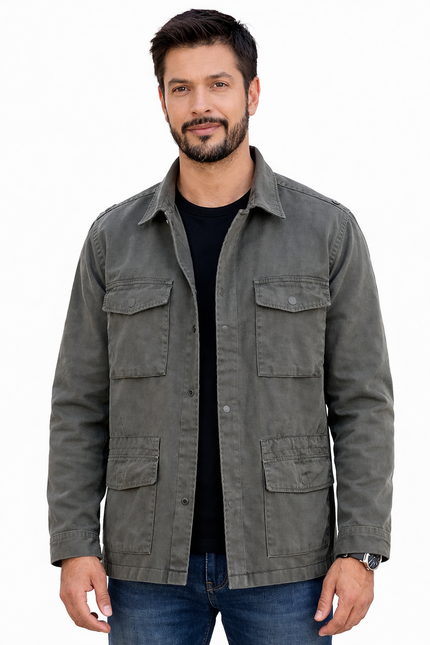 Man wearing a gray jacket on a white background