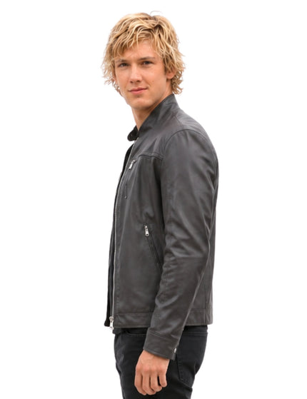 Man wearing a gray jacket on a white background