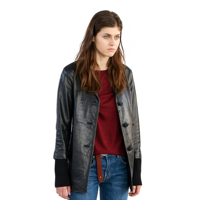 Woman wearing a black leather jacket over a red shirt and blue jeans on a white background