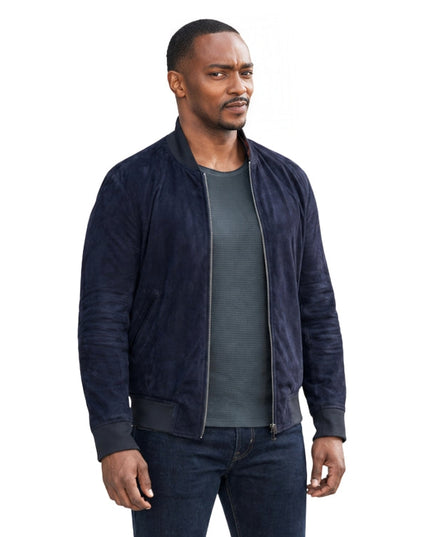 Person wearing a blue bomber jacket 