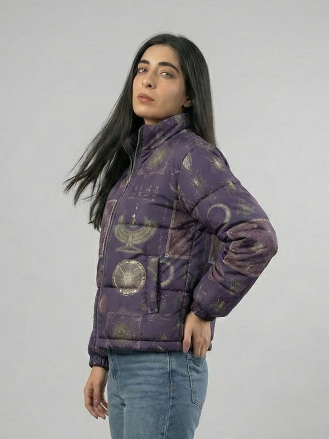 Woman wearing a purple patterned jacket against a plain background