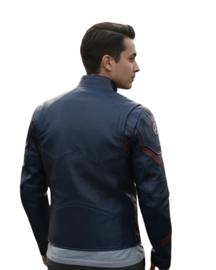 Person wearing a blue jacket with patches on a white background