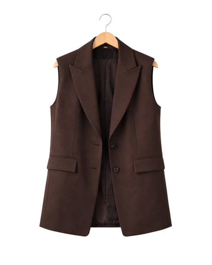Brown vest on a hanger against a white background