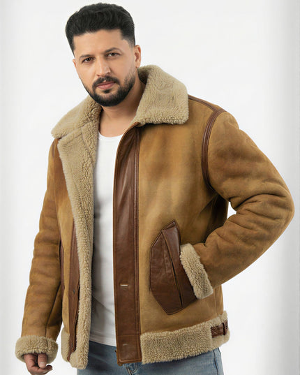 Man wearing a brown shearling jacket on a white background