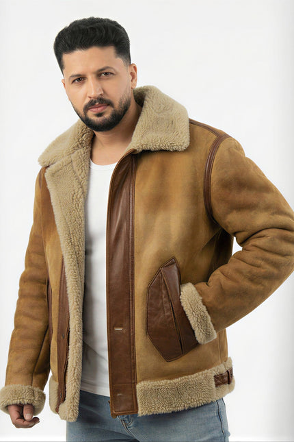 Man wearing a brown shearling jacket on a white background