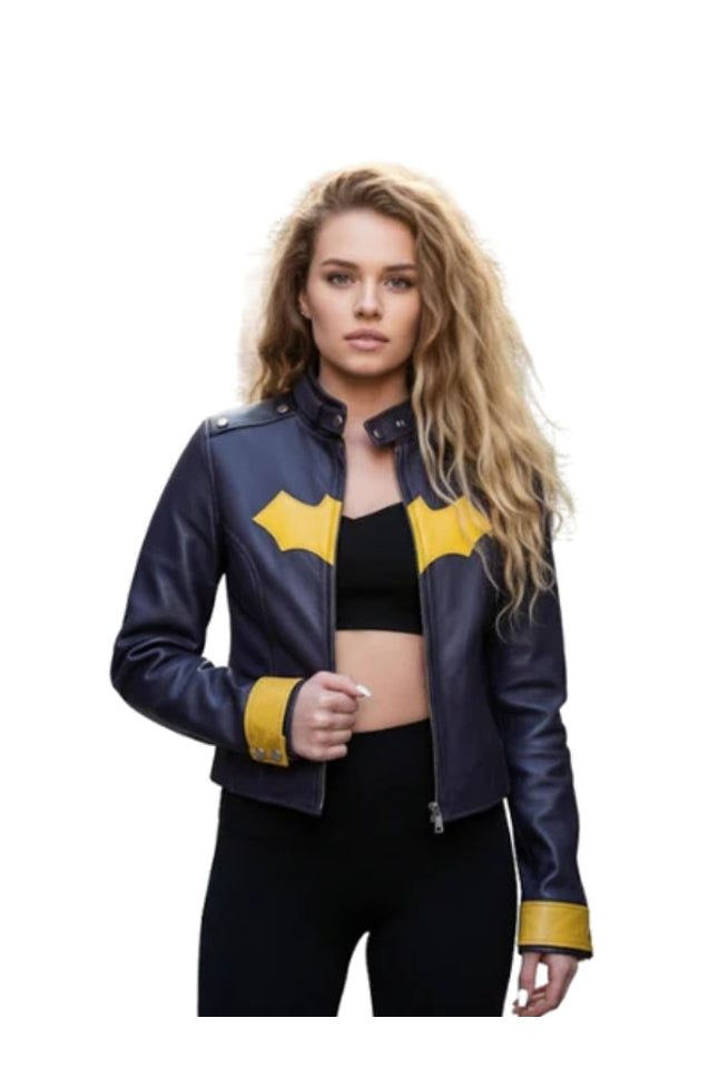 Woman wearing a blue leather jacket with yellow accents on a white background