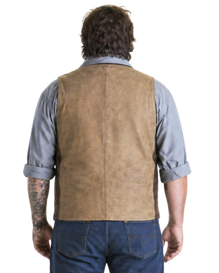 Man wearing a brown vest over a blue shirt on a white background