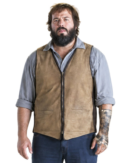 Man wearing a brown vest over a gray shirt on a white background