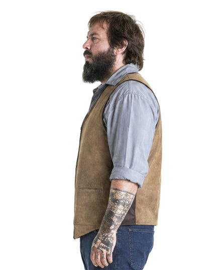 Man wearing a brown vest over a gray shirt on a white background