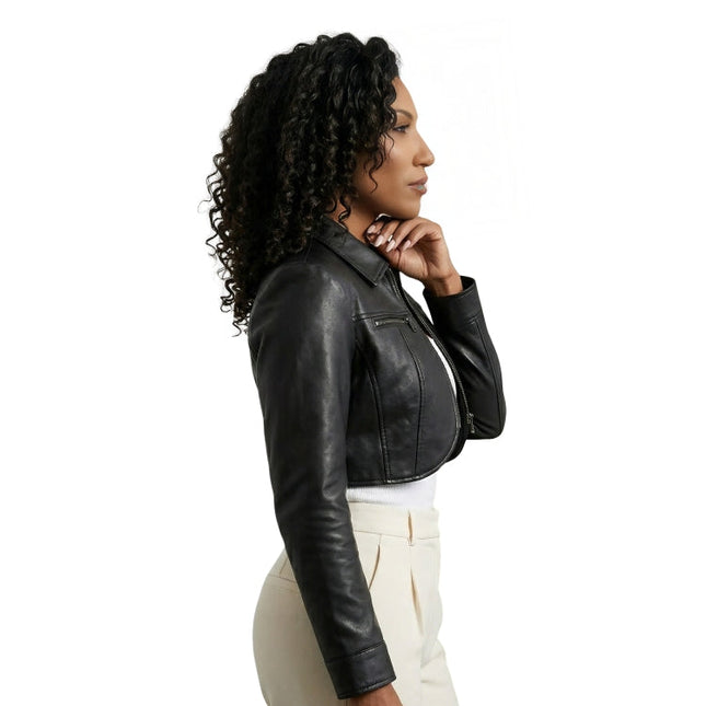 Woman wearing a black leather jacket on a white background