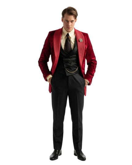 Man wearing a red blazer with black accent on a white background