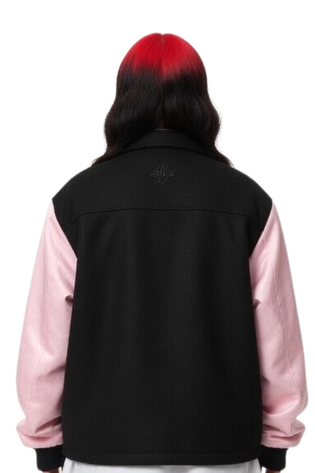 Person wearing a black and pink jacket on a white background