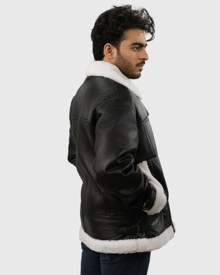 Man wearing a black leather jacket with white fur lining on a white background