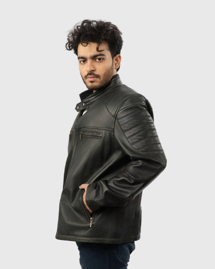 Man wearing a black leather jacket on a white background