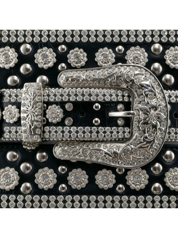 Decorative belt with silver buckle and floral patterns on a black background