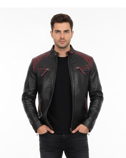 Man wearing a black leather jacket with red accents on a white background