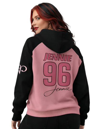 Person wearing a black and pink hoodie with 'Jennie 96' text on the back.