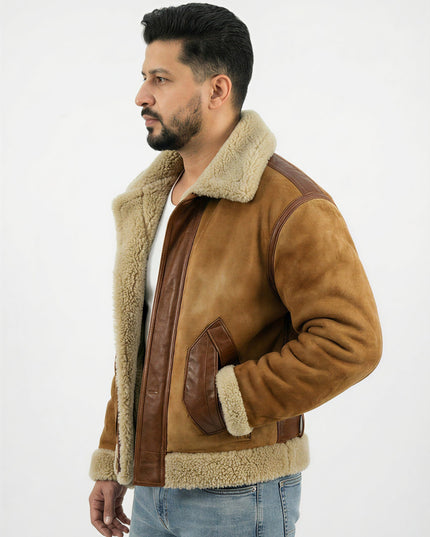 Man wearing a brown shearling jacket on a white background