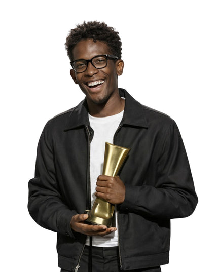 Man holding a gold trophy against a white background