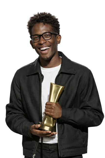 Man holding a gold trophy against a white background