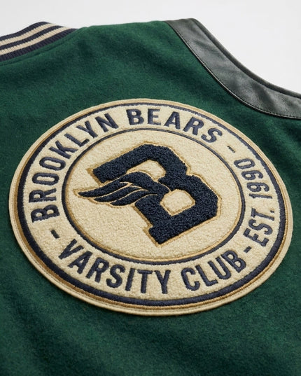 Green jacket with 'Brooklyn Bears Varsity Club' patch on a white background