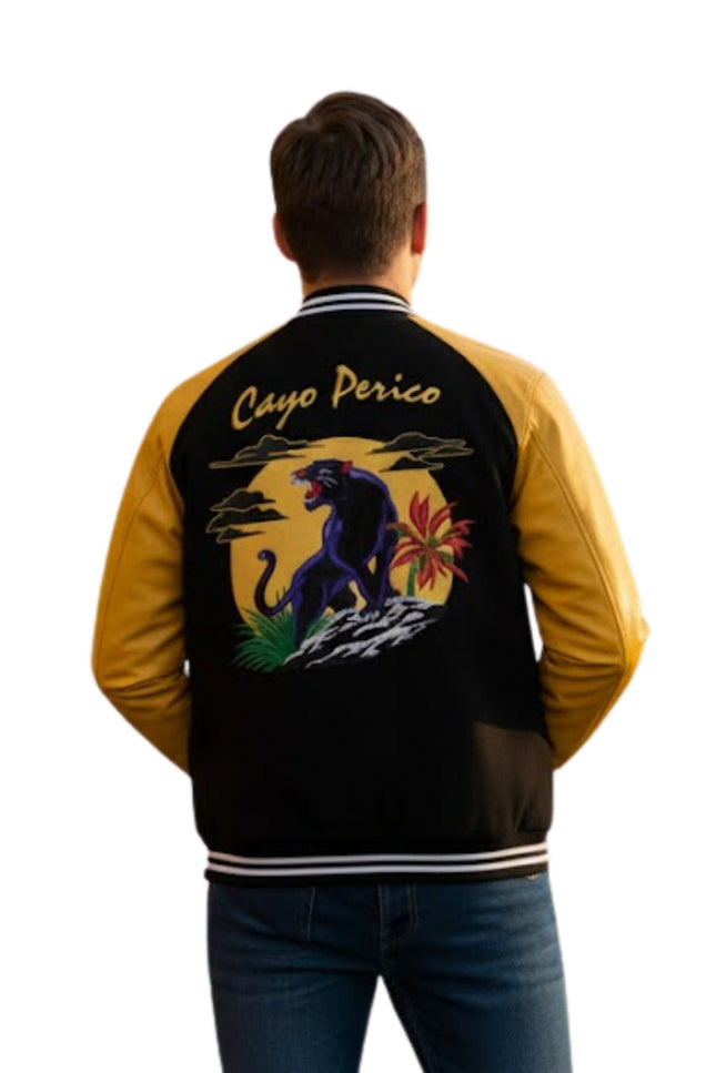Person wearing a black and yellow jacket with a panther design and 'Cayo Perico' text on the back.