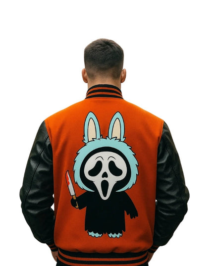 Person wearing an orange and black varsity jacket with a cartoon character on the back