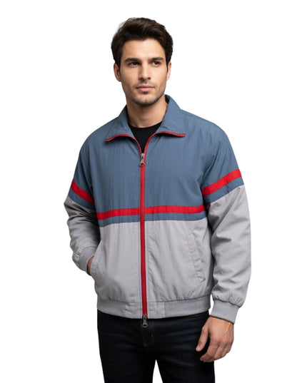 Man wearing a gray jacket with red stripes on a white background