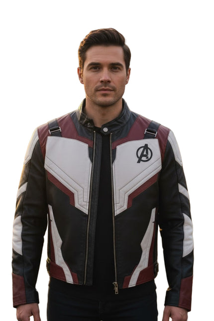 Man wearing a superhero jacket with a logo in a field during sunset