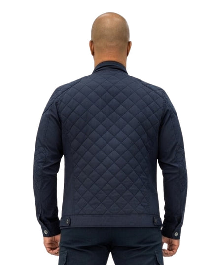 Person wearing a blue cotton jacket on a white background 