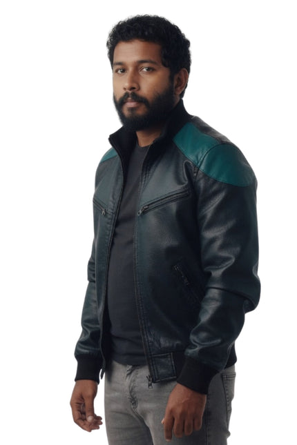 Man wearing a black leather jacket with green accents on a white background