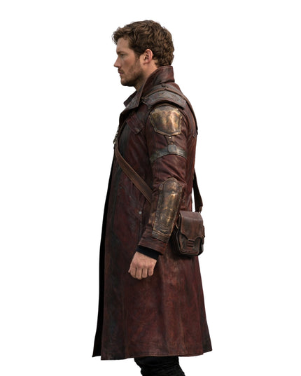 Person wearing a detailed brown leather coat with armor plating on a white background