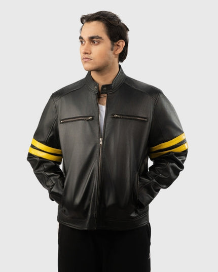 Man wearing a black leather jacket with yellow stripes on a white background