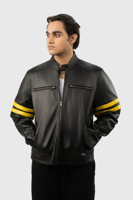 Man wearing a black leather jacket with yellow stripes on a white background