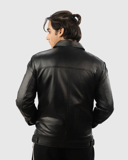Person wearing a black leather jacket on a white background