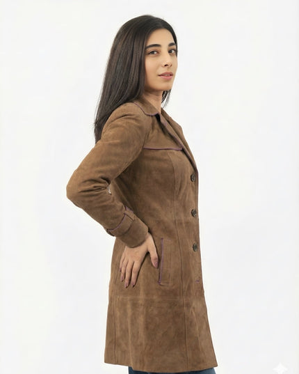 Woman wearing a brown suede coat on a white background