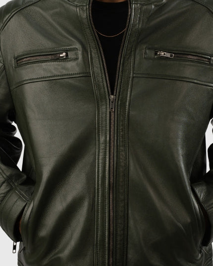 Green leather jacket with zippers on a white background