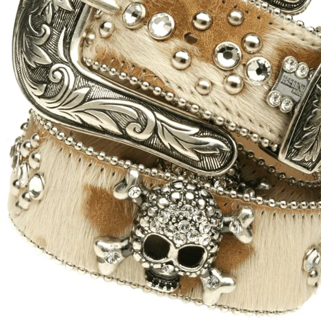 Decorative belt with skull design and embellishments on a white background