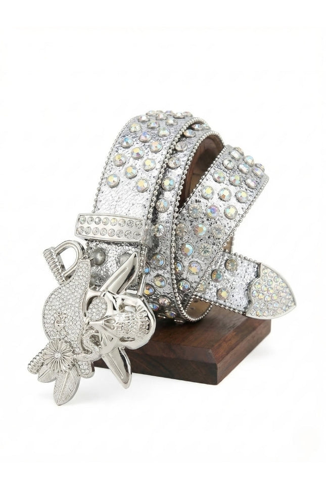 Decorative belt with crystal embellishments and a silver buckle on a white background