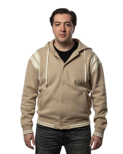Man wearing a beige hoodie with white accents on a white background