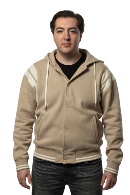 Man wearing a beige hoodie with white accents on a white background