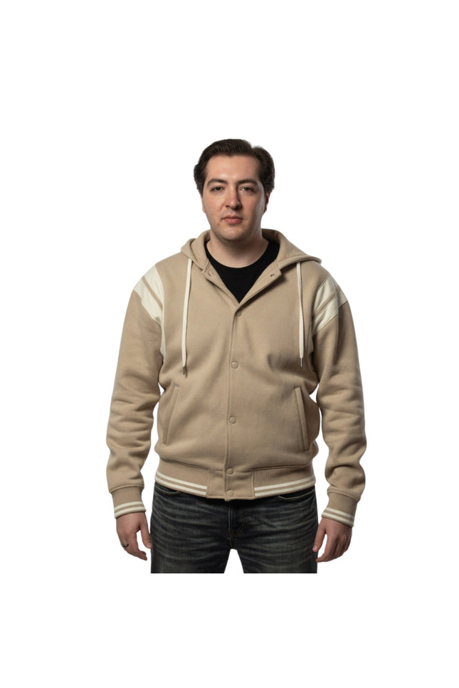 Man wearing a beige hoodie with white accents on a white background