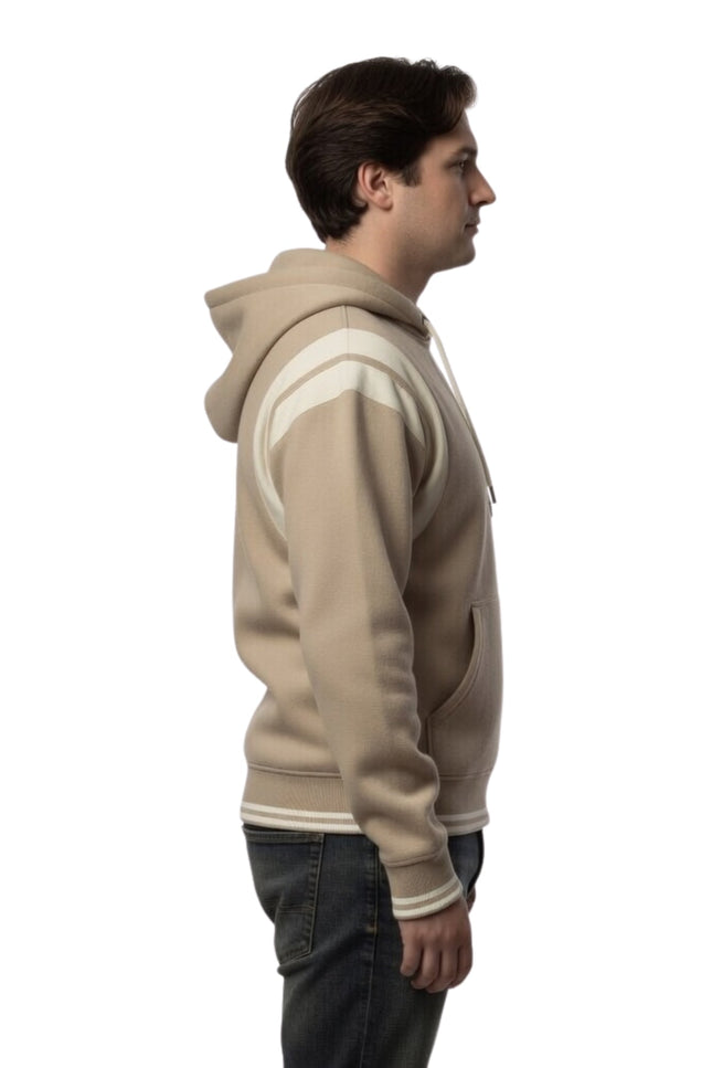 Man wearing a beige hoodie with white stripes on a white background